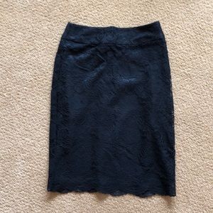 Fully lined black lace skirt